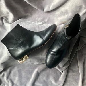 Black leather ankle boots